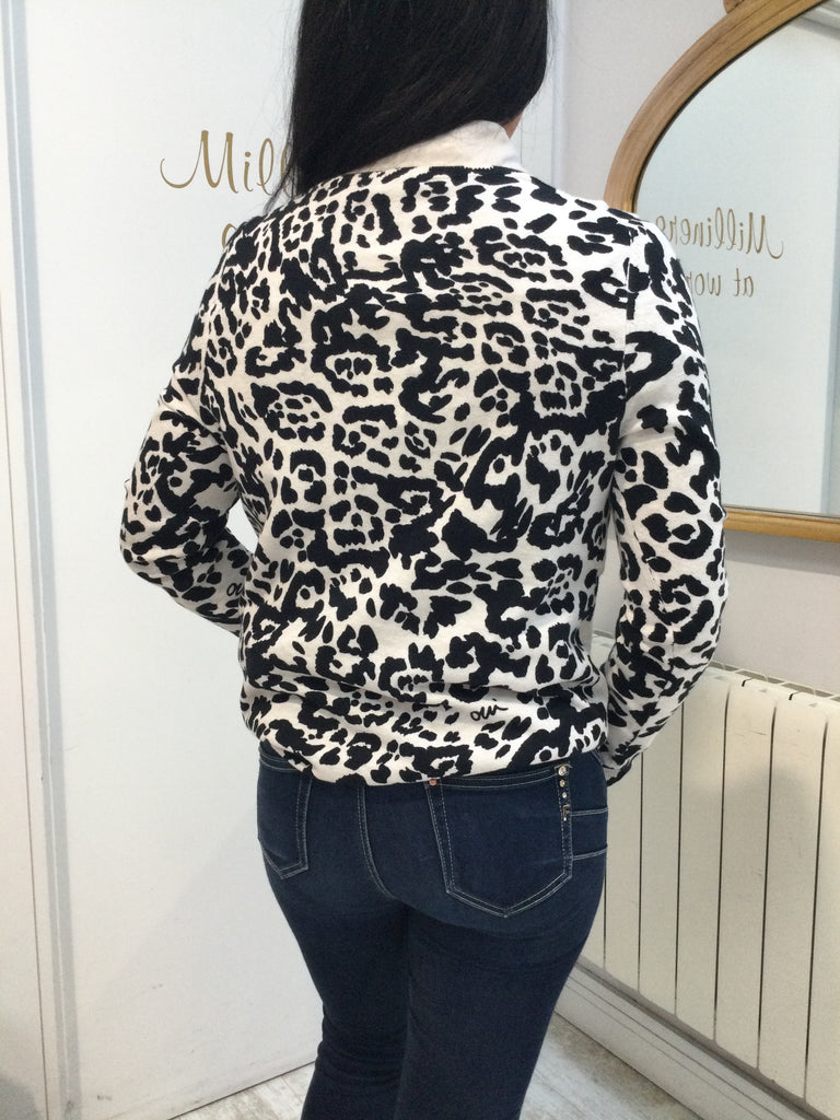 Sweater in light stone and black with leopard design