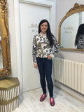 Sweater in light stone and black with leopard design