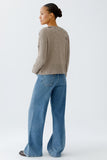 Plain knit sweater with sequin motifs