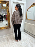 Soft bomber in animal print