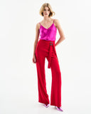Red crepe trousers with rhinestone belt