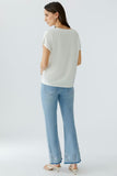 T-shirt in off white with lemon and diamanté logo
