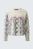 Knitted sweater in snake print, nude and peach whip