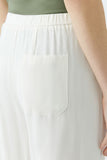 Flowing slip on trousers in creamy champagne colour