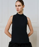 Long top with feathers