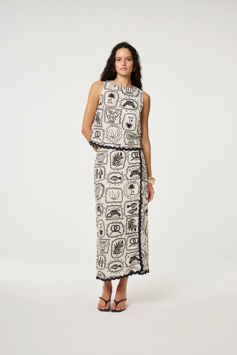 Wrap effect skirt in black and cosy white with nautical pattern and braiding
