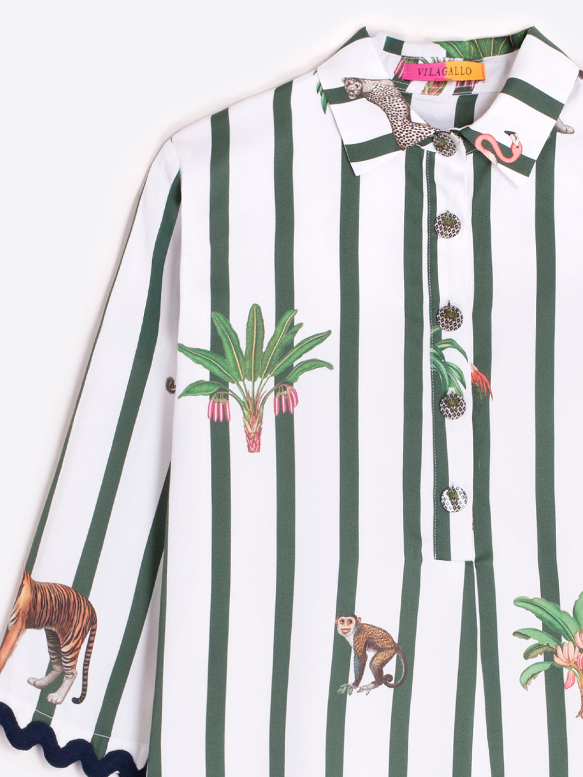 White tunic dress with green vertical stripes and animal print