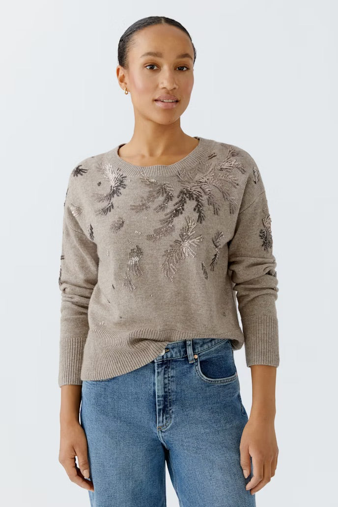 Plain knit sweater with sequin motifs
