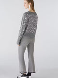 Grey jeans with studs and hem detail