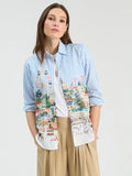 Vertically striped shirt in blue and white with panoramic illustration