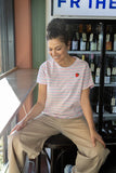Feminine T-shirt with classic stripes and strawberry appliqué.