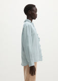 Long sleeve blouse in glacial blue with ruffle trim