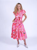 “Nice” dress in pink patch pattern.