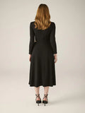 Black dress with gold chain