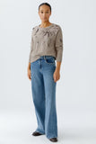 Plain knit sweater with sequin motifs