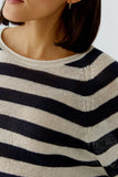 navy and beige striped sweater
