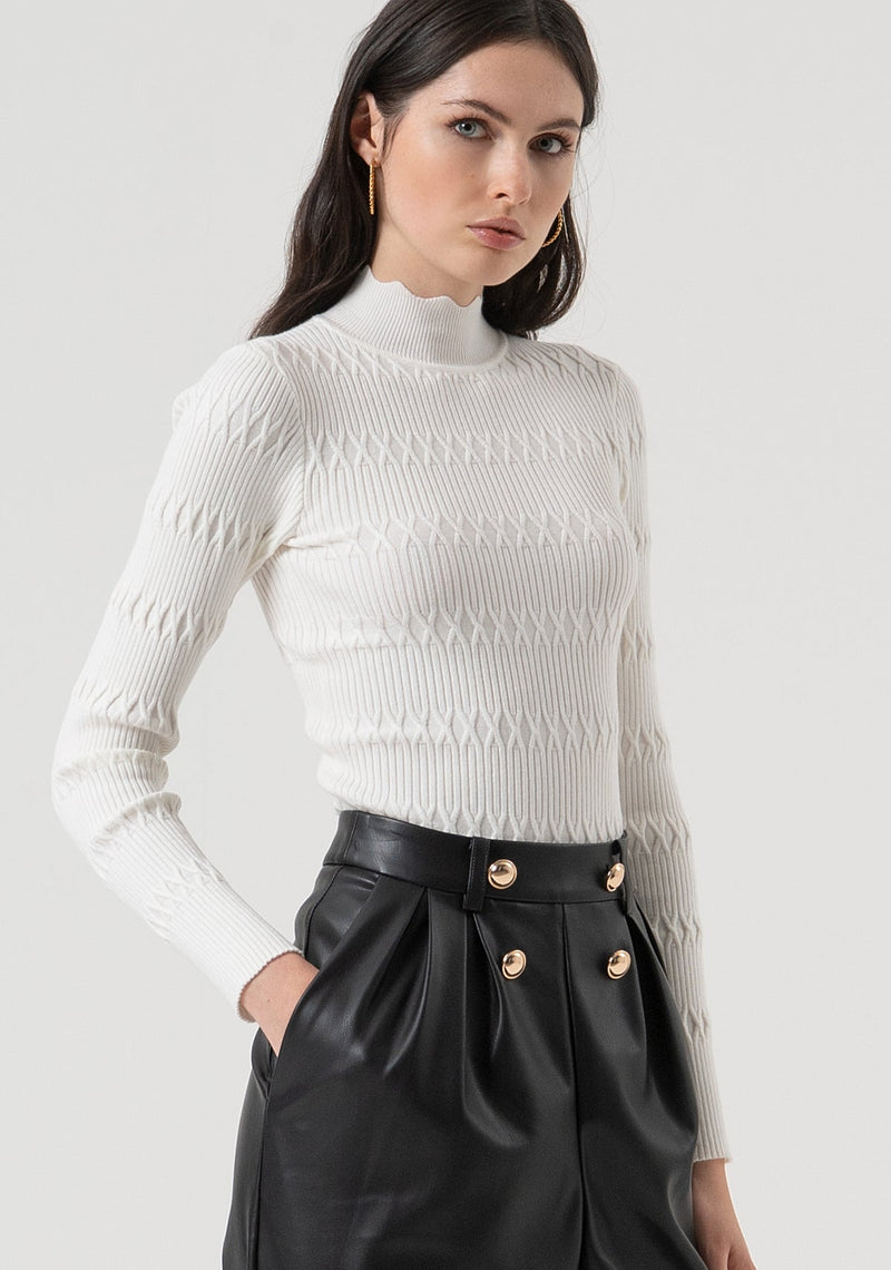 Black carrot trousers in leather look fabric