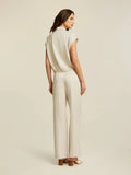 Cropped top in Matt satin. Light stone colour.