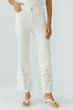 Cropped summer jeans with elaborate embroidery at the hemline