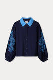 Elaborate blouse in dark blue with decorative collar