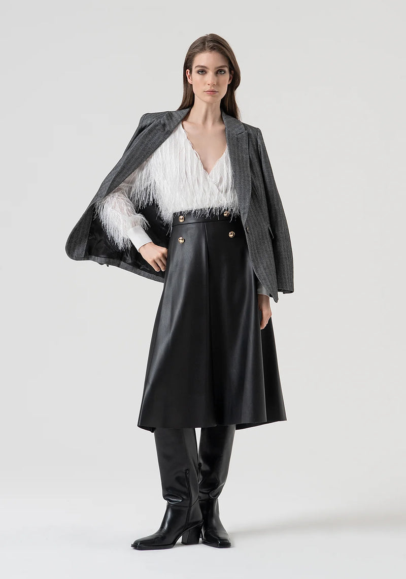 Flared black skirt in fake leather