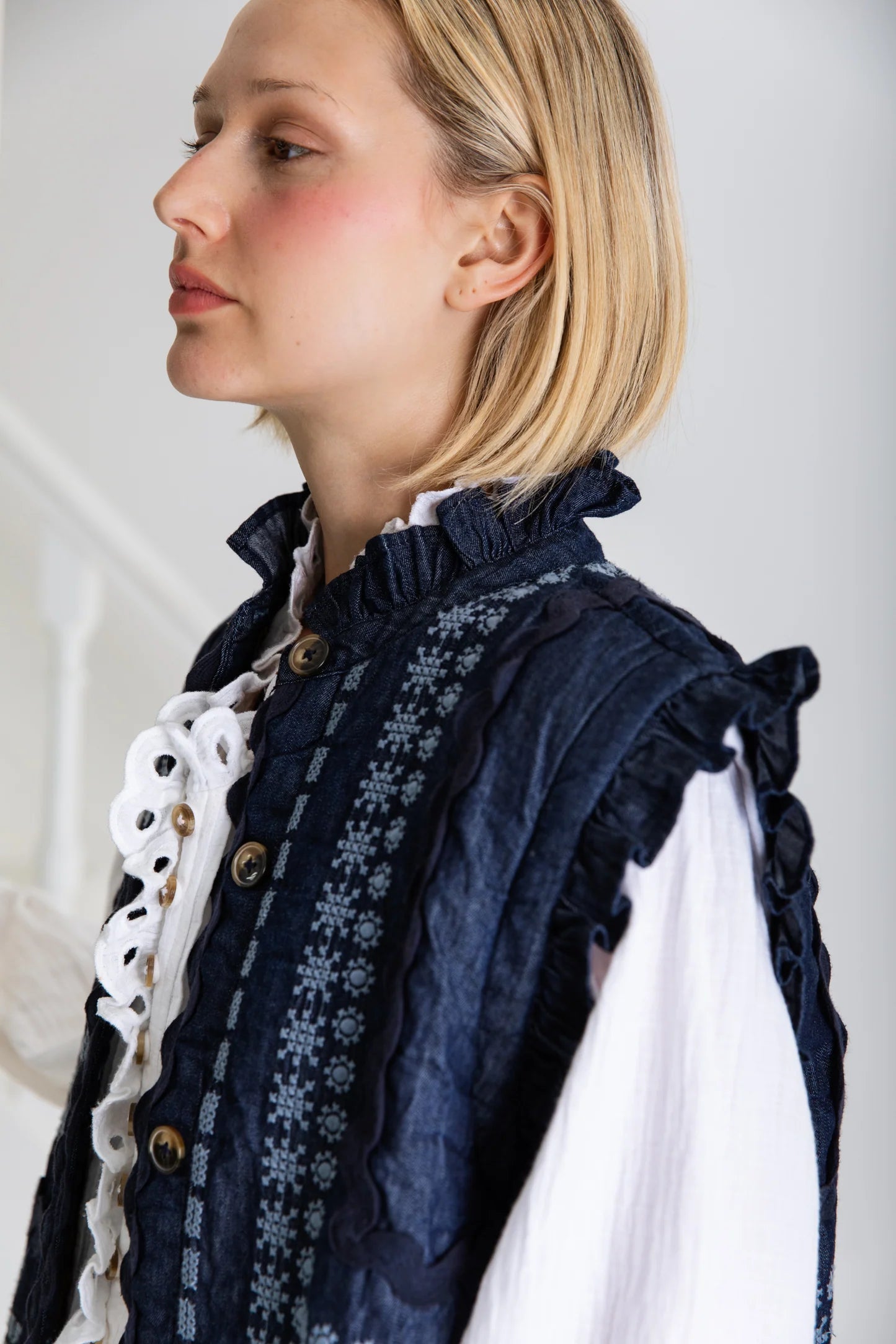 Denim gilet with frill collar and embroidery in blue