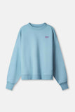 Sweatshirt in dawn blue with magenta design on back