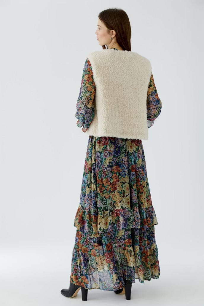 Cosy knitted vest in ecru fur look