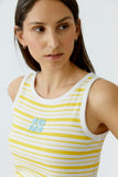 Tank top in off white and yellow with hand stitched beads