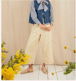 Loose fitting 3/4 length trousers with ditsy print