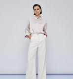 Wide leg vanilla cream pants with a fluffy texture