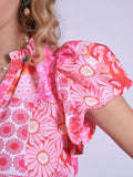 “Nice” dress in pink patch pattern.