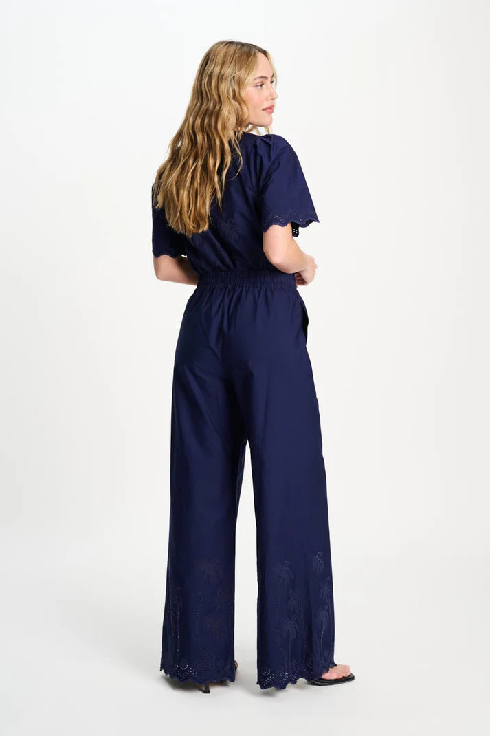 Dark blue trousers in Broderie Anglaise