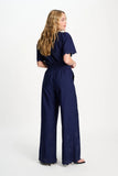 Dark blue trousers in Broderie Anglaise