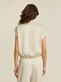 Cropped top in Matt satin. Light stone colour.