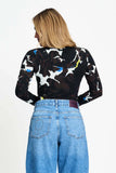 Brown long sleeve top with bovine print