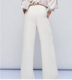 Wide leg vanilla cream pants with a fluffy texture