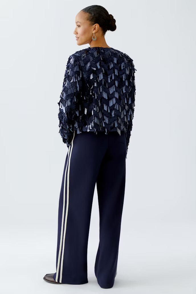 Boxy navy jacket with a contrast of matte-glossy sequins