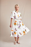 Tiered shirt dress in white with flowers and butterfly design