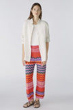 Knitted ankle length trousers in zig zag stripes