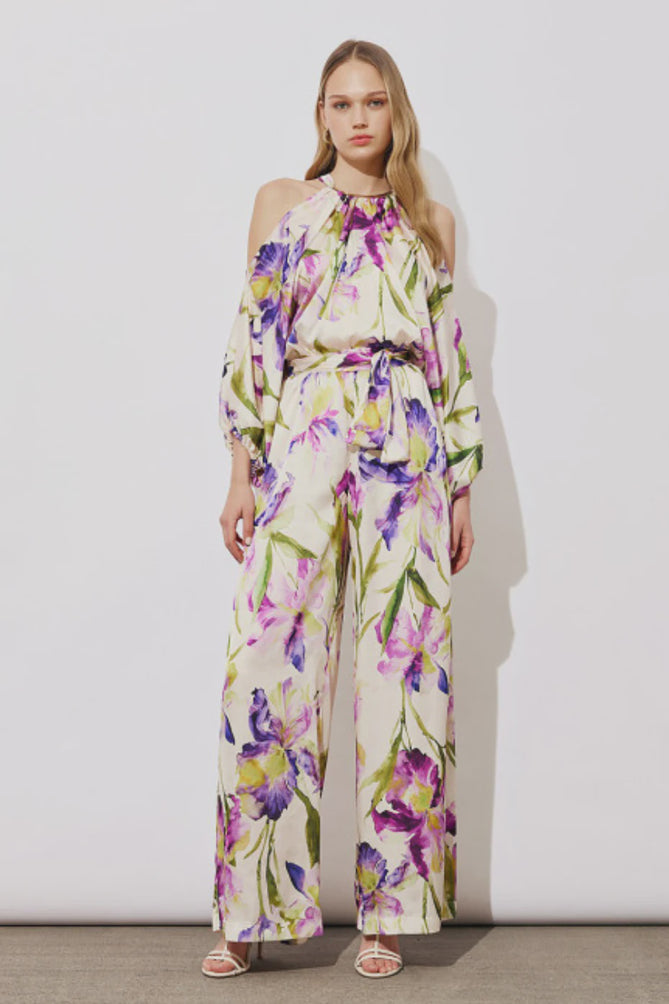 Cold shoulder jumpsuit in cream with floral pattern in purples and green
