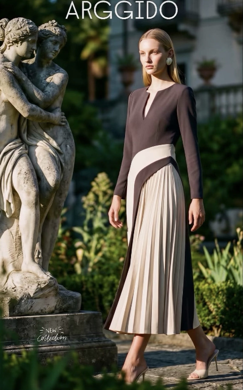 Bicolour pleated dress in black and cream
