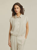 Cropped top in Matt satin. Light stone colour.