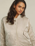 Light gold bomber in crinkled padded fabric