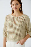 Cropped pullover in gold stone.