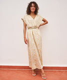 White and camel maxi dress in electric print with gold belt