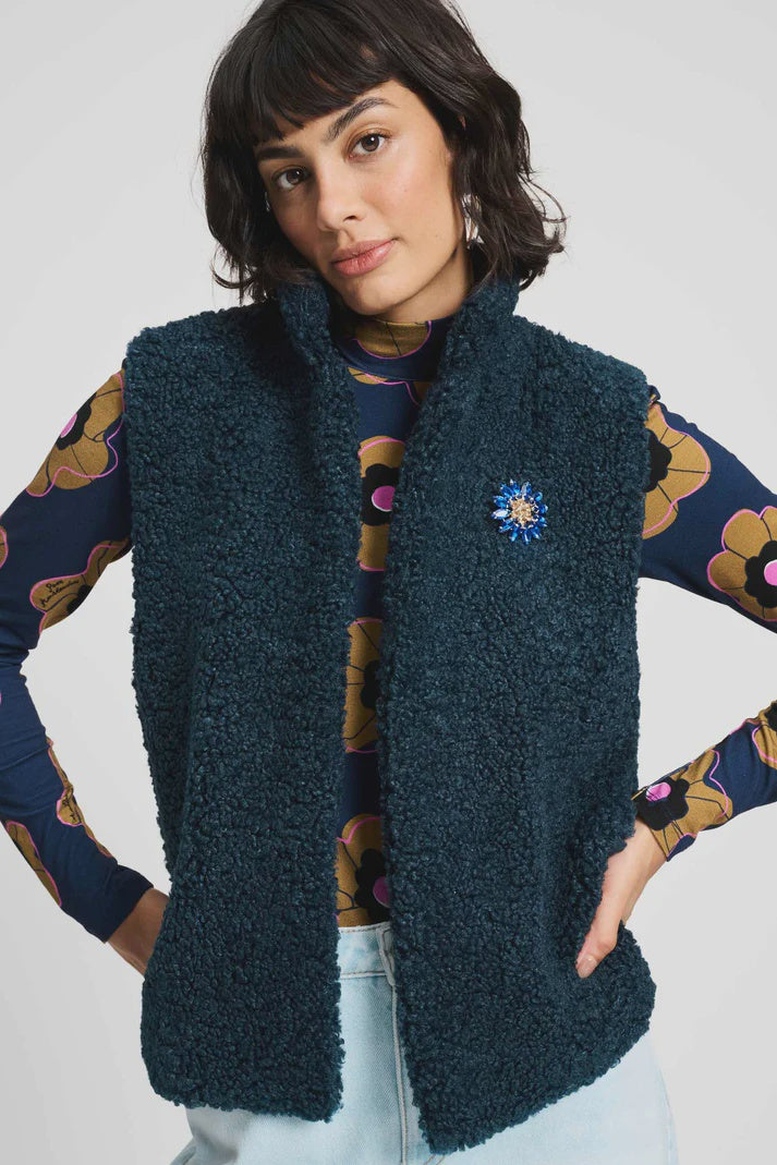 Navy astrakhan gilet with brooch