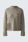 Cosy sweater with faux leather details