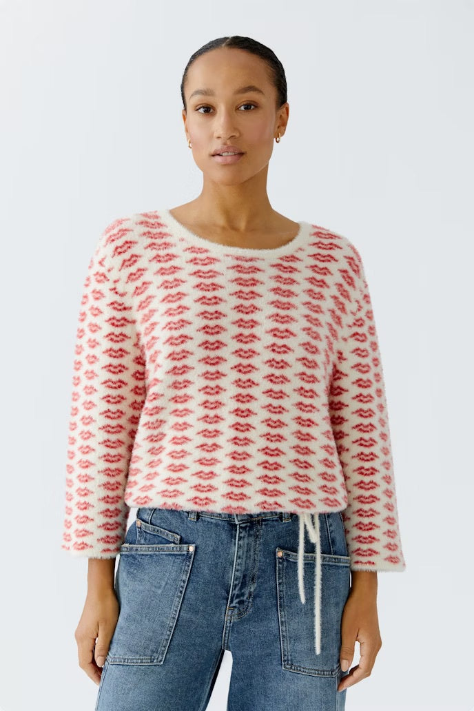 Cuddly sweater with all over lip motif