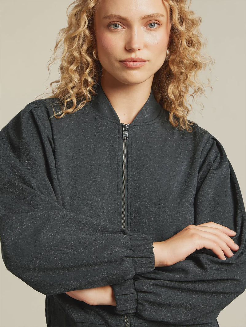 Navy bomber jacket in jersey fabric. Coordinating trousers also available.